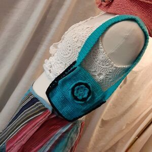 Blue and black knit purse.